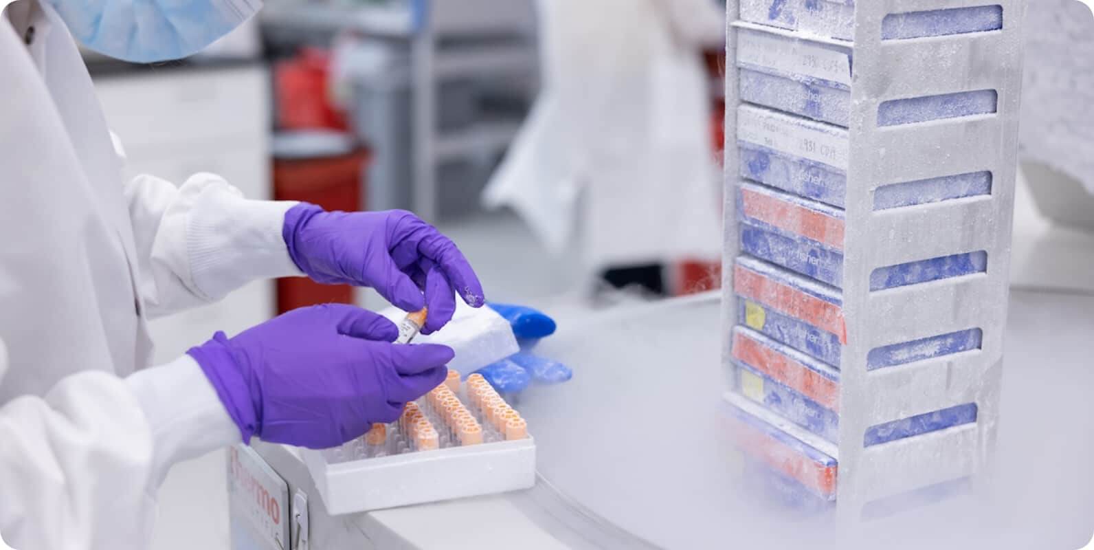 A Lyell lab employee working with a sample