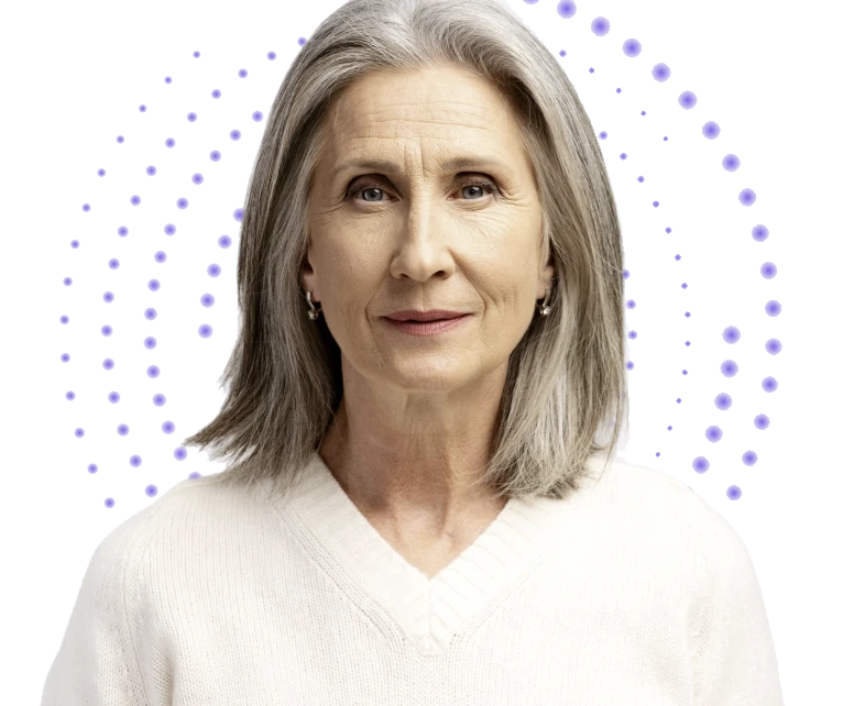 An older woman looking straight ahead with a relaxed look on her face.